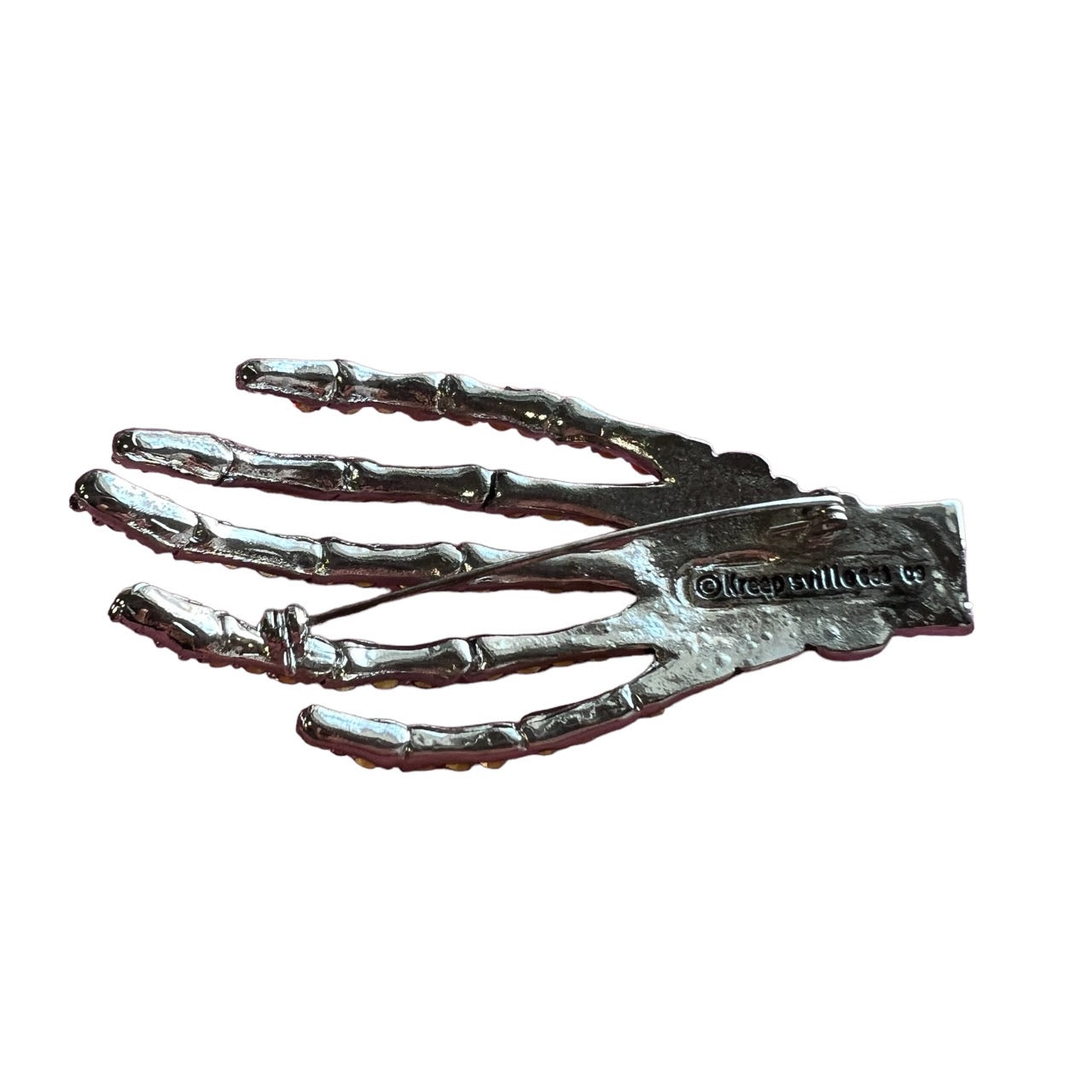 skeleton bone hand brooch
