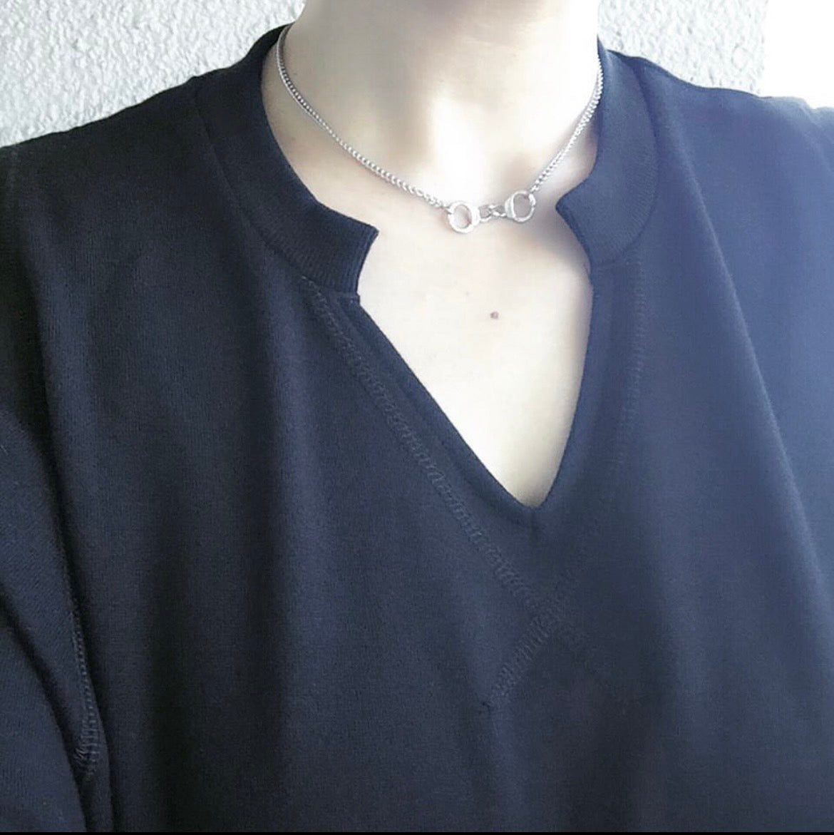 hand cuffs necklace