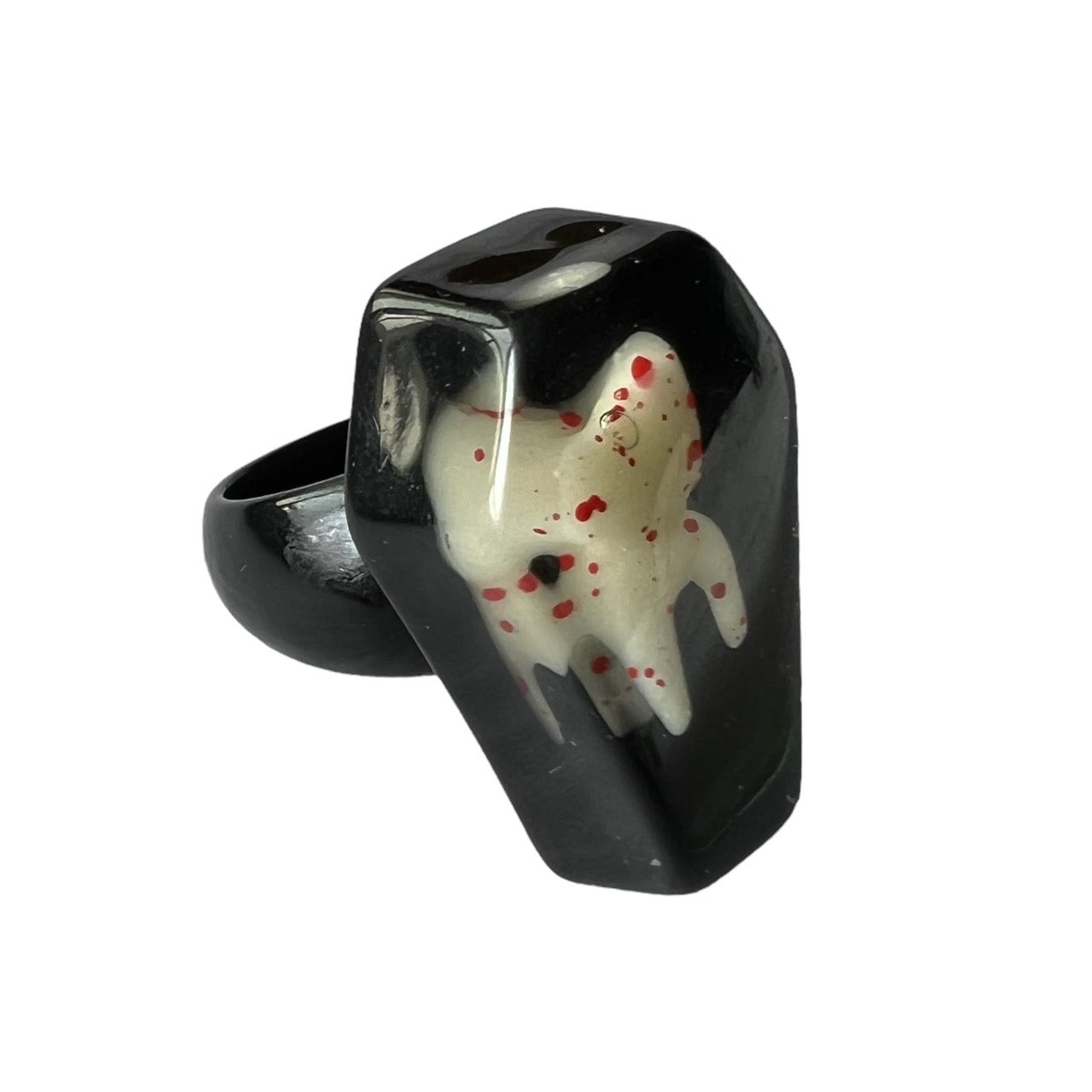 Blood-splattered tooth coffin ring